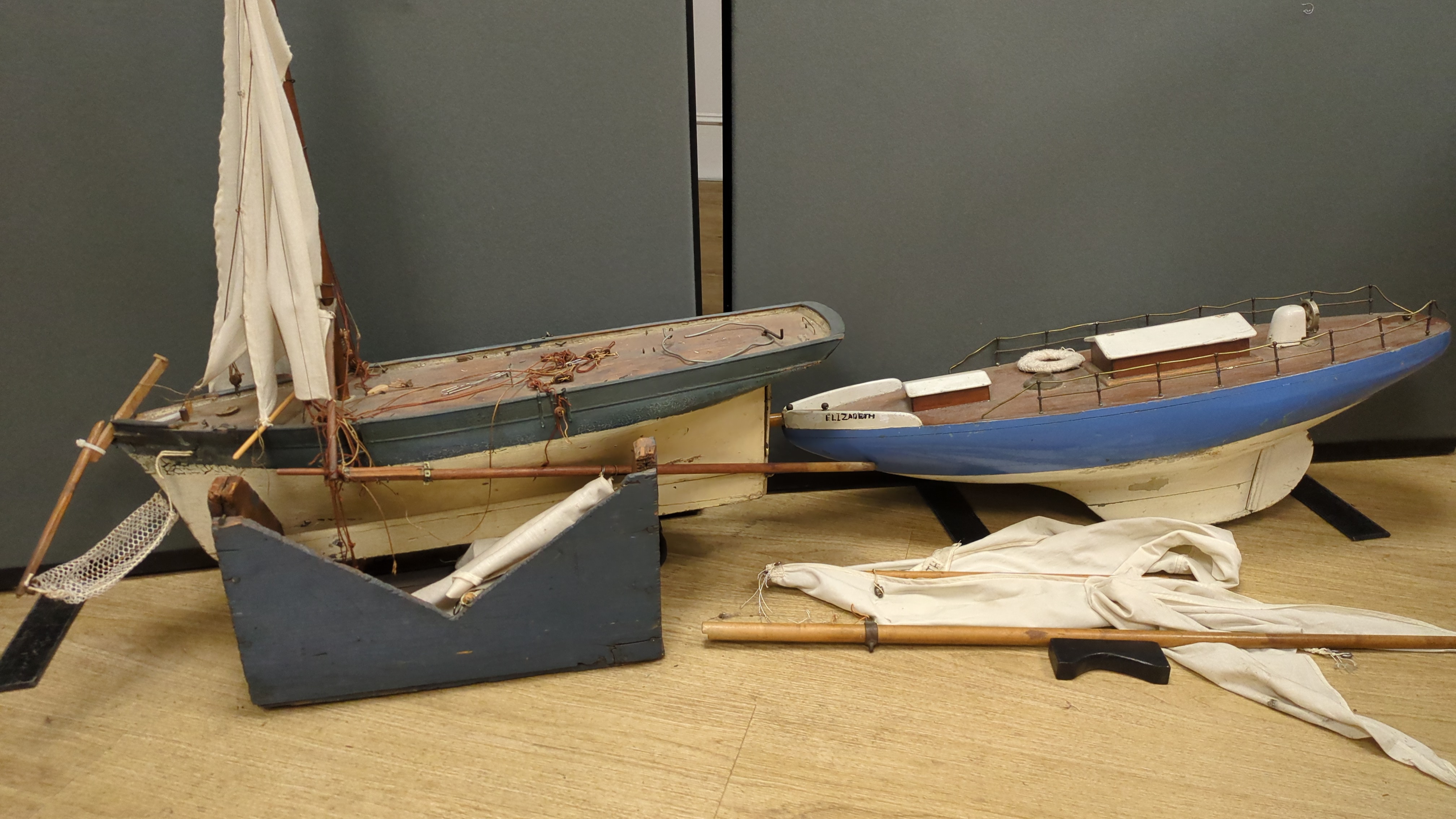 Two large over-painted pond yachts, largest 91cms